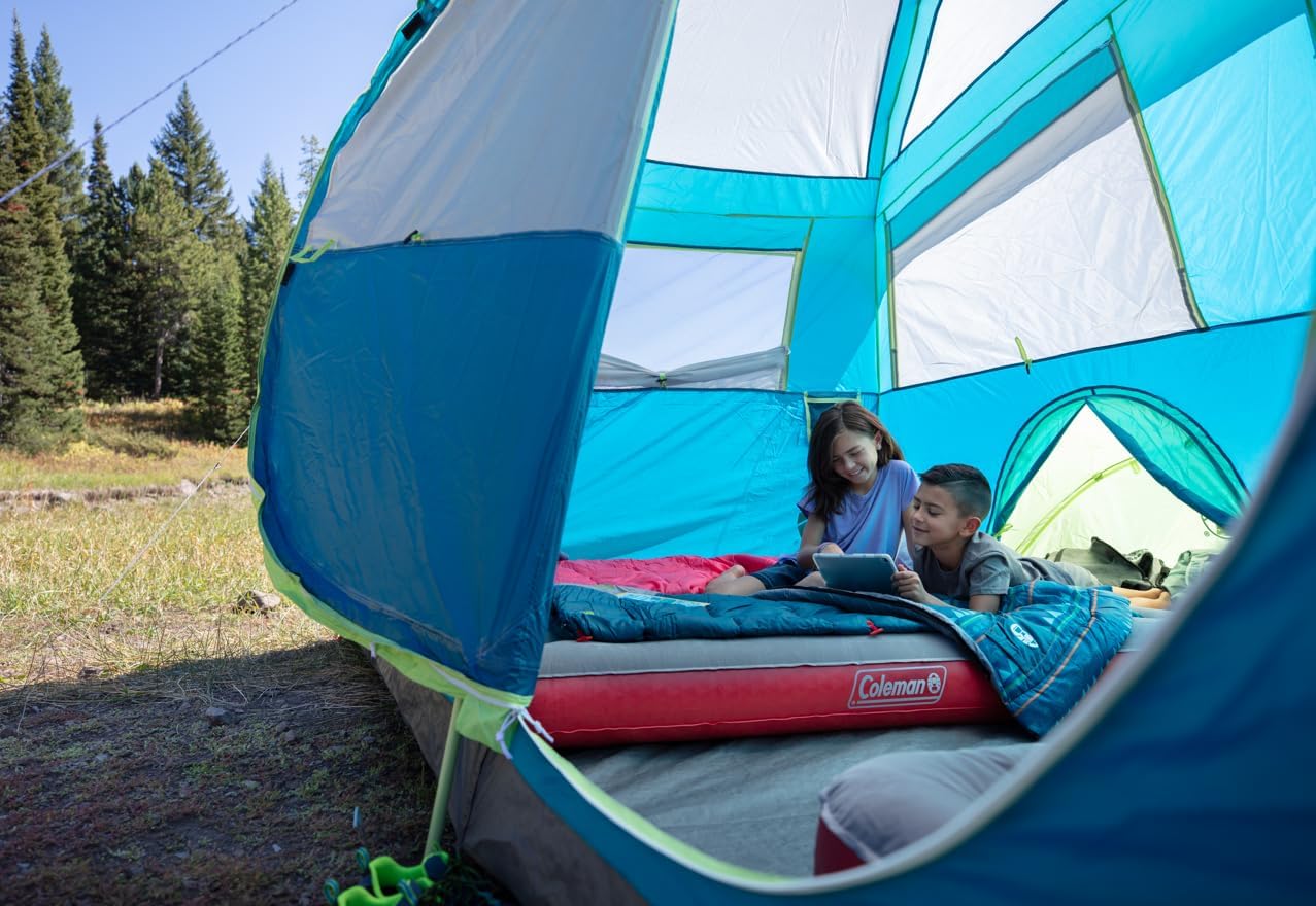 Coleman Kids 50°F Sleeping Bag, Comfortable Youth Sleeping Bag for Sleepovers & Camping, Fits Children up to 5ft Tall, Glow in The Dark Design, Stuff Sack Included, Machine Washable